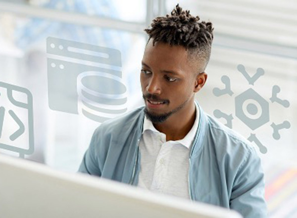man working on a desktop computer