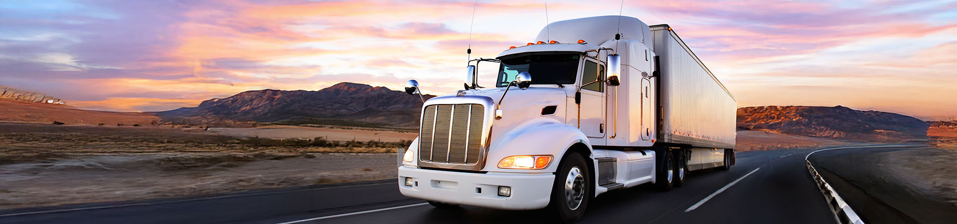 An 18-wheeler on a desert highway