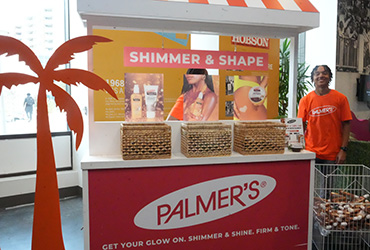 Man standing at a Palmers kiosk