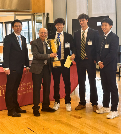 Debate Minds – Eric Zhou (Bullis School, MD), Evan Kim (Bullis School, MD), Noah Margolis (Bullis School, MD) w/ Dean Sepehri & Competition Chair Dr. Hua